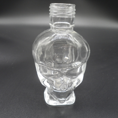 Skull shape glass oil bottle