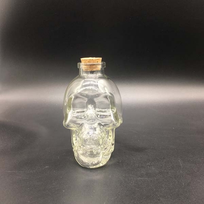 Wood cork type skull shape bottle